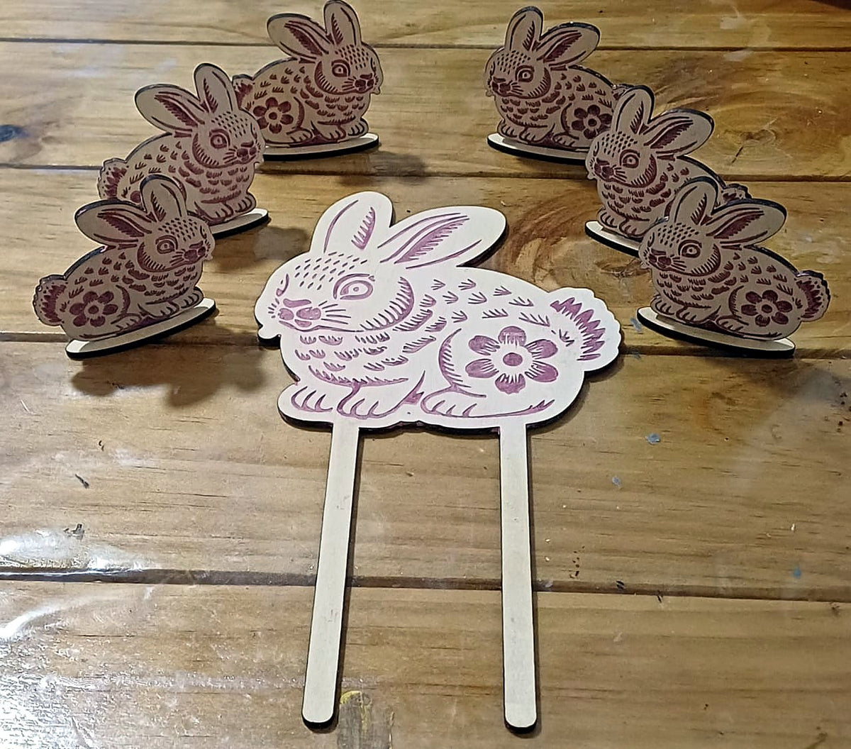 Laser cut and engraved bunny decorations in timber