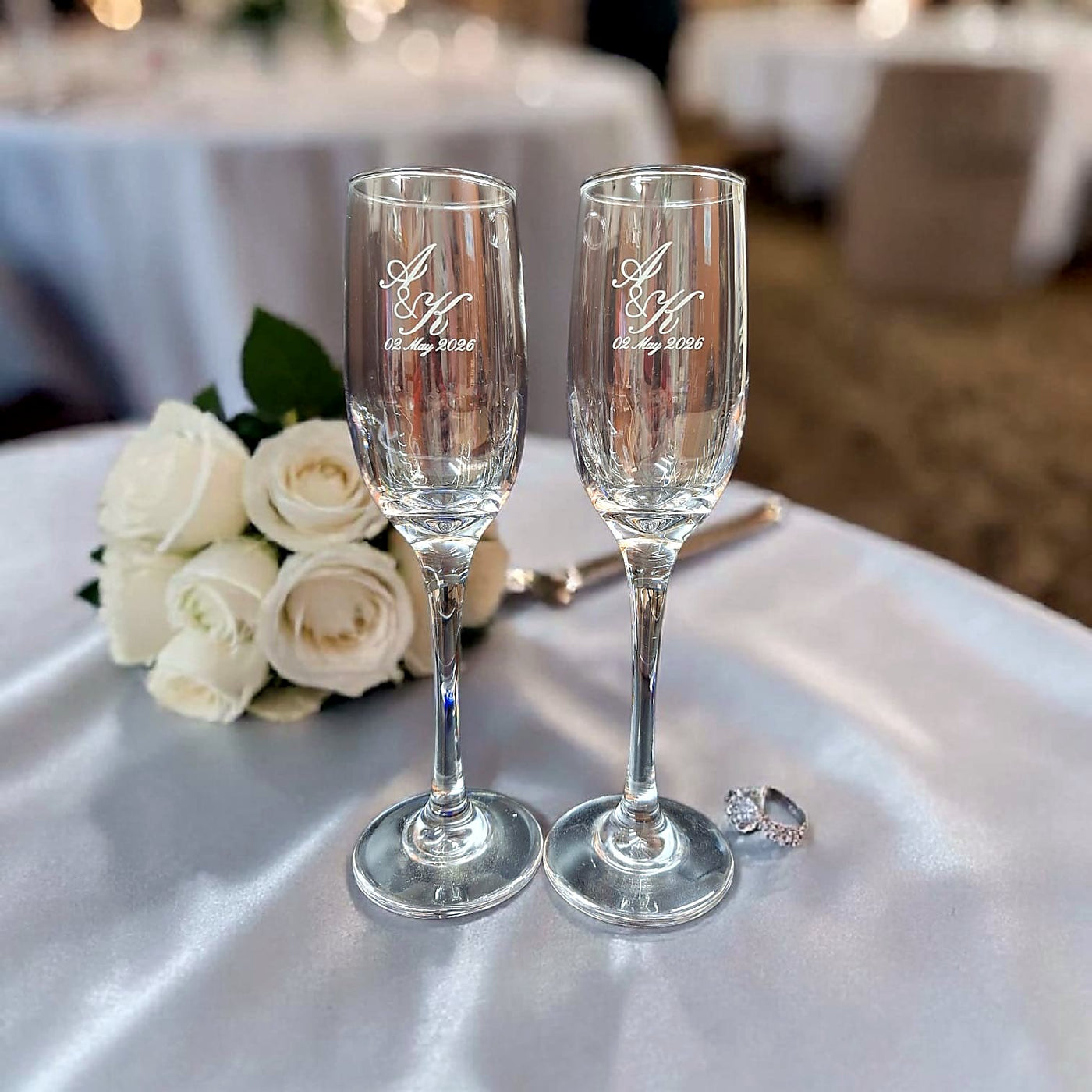 Pair of personalised champagne flutes with elegant laser engraving