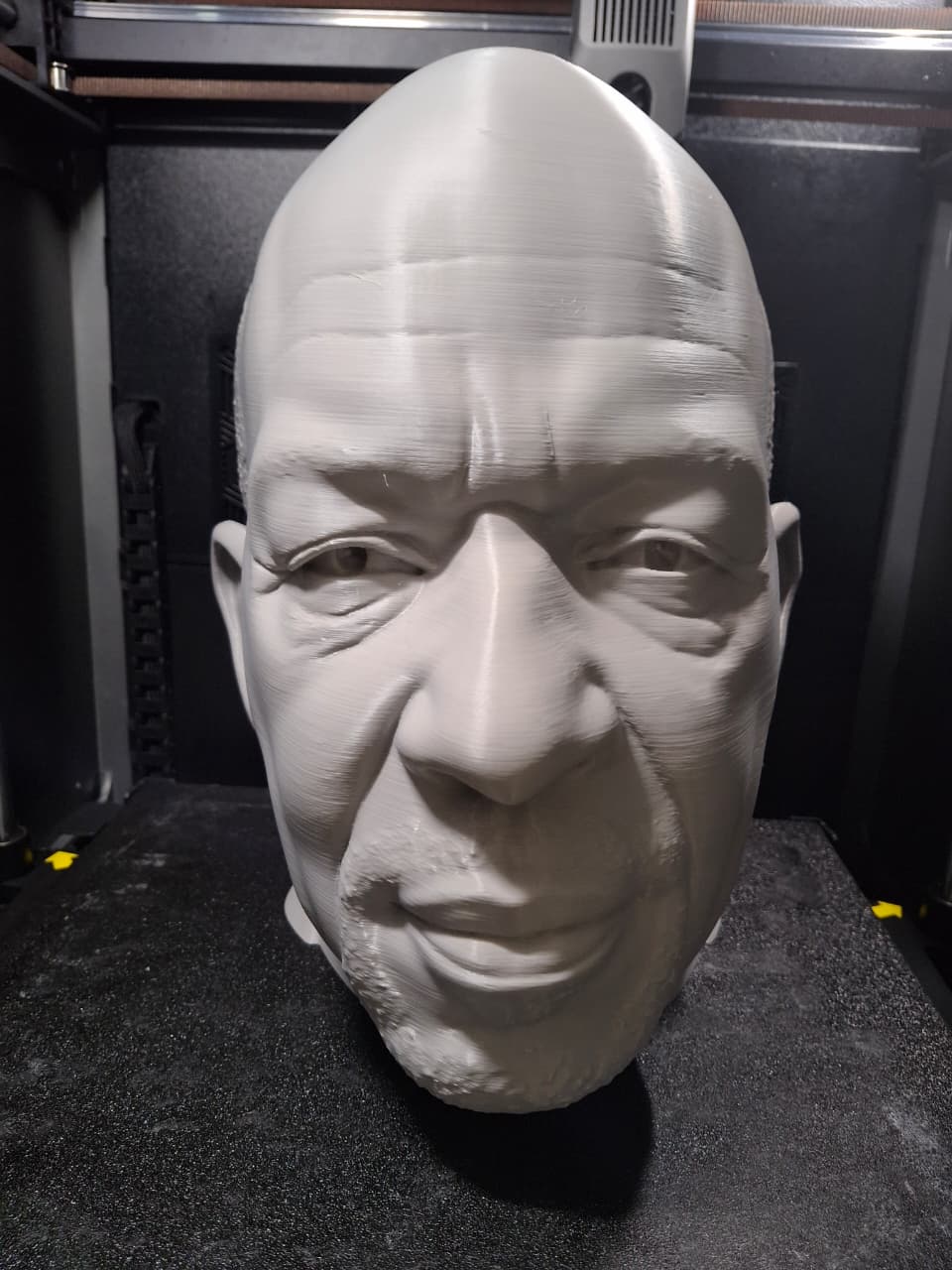 Front view of a large custom 3D printed portrait sculpture