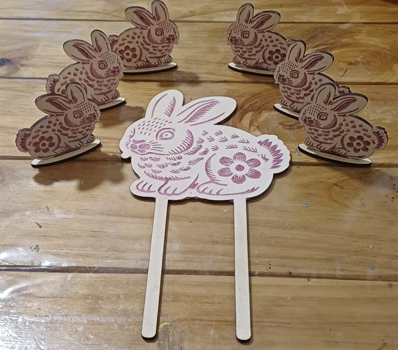 Laser-cut acrylic bunny decorations made for a small creative business